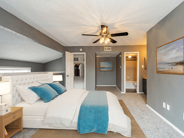 Large primary bedroom at summit on the lake apartments